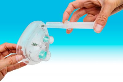Inflation syringe to adjust seal pressure